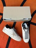 Men's Super-Star with black heel tab and metal stud lettering