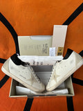 Men's Super-Star with black heel tab and metal stud lettering